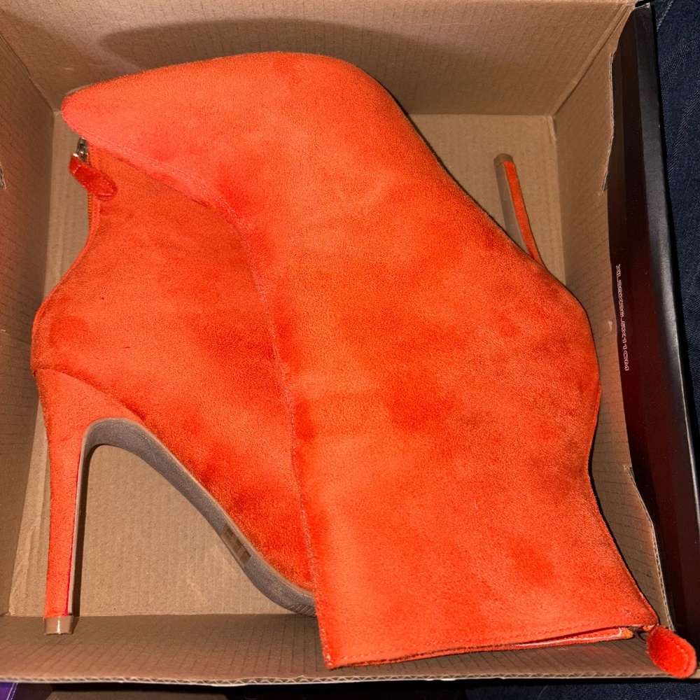 Orange heeled boots